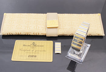 ボーム＆メルシェの時計と付属品の袋と保証書とベルトのコマ