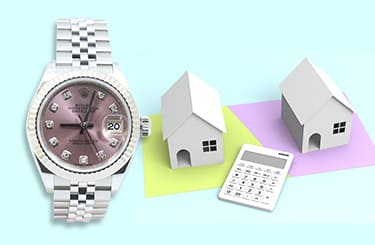 ロレックスのデイトジャスト時計と家と電卓