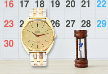 オメガの時計とカレンダーと砂時計