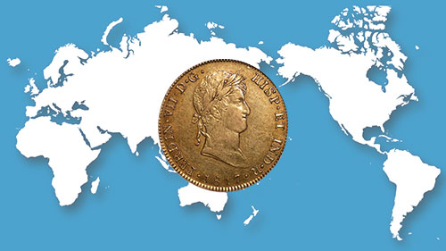 海外のコイン金貨と世界地図