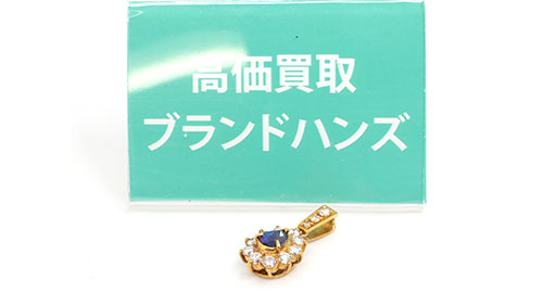 傷のあるK18のブルーサファイアトップ全体