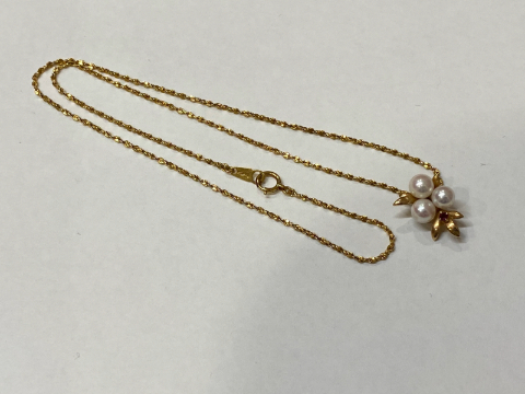 傷のあるK18パールルビーネックレス