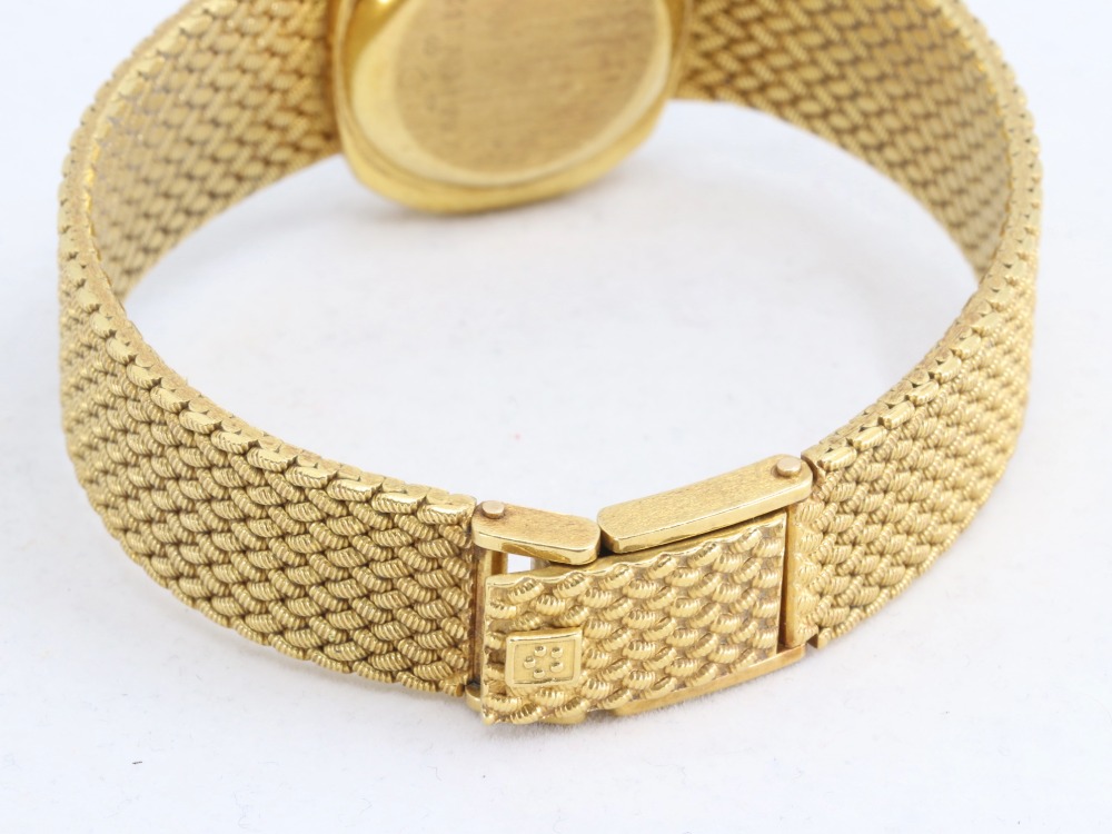 エテルナのK18(18金)腕時計QZバックル