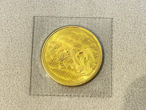 天皇陛下御在位60年記念10万円金貨