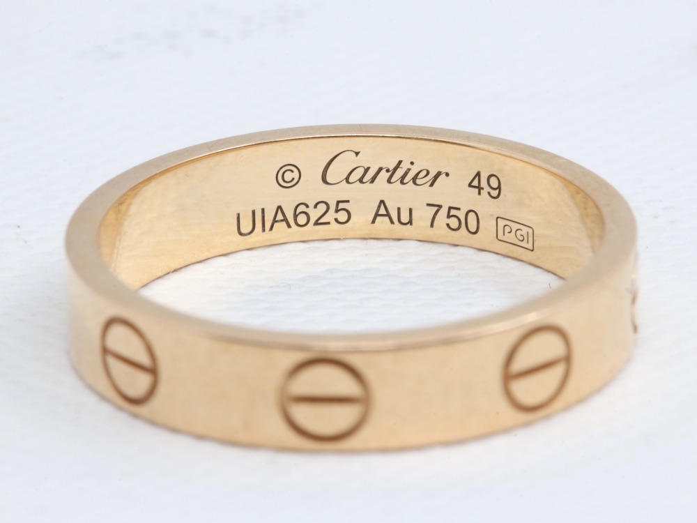 カルティエのミニラブリング750PG刻印