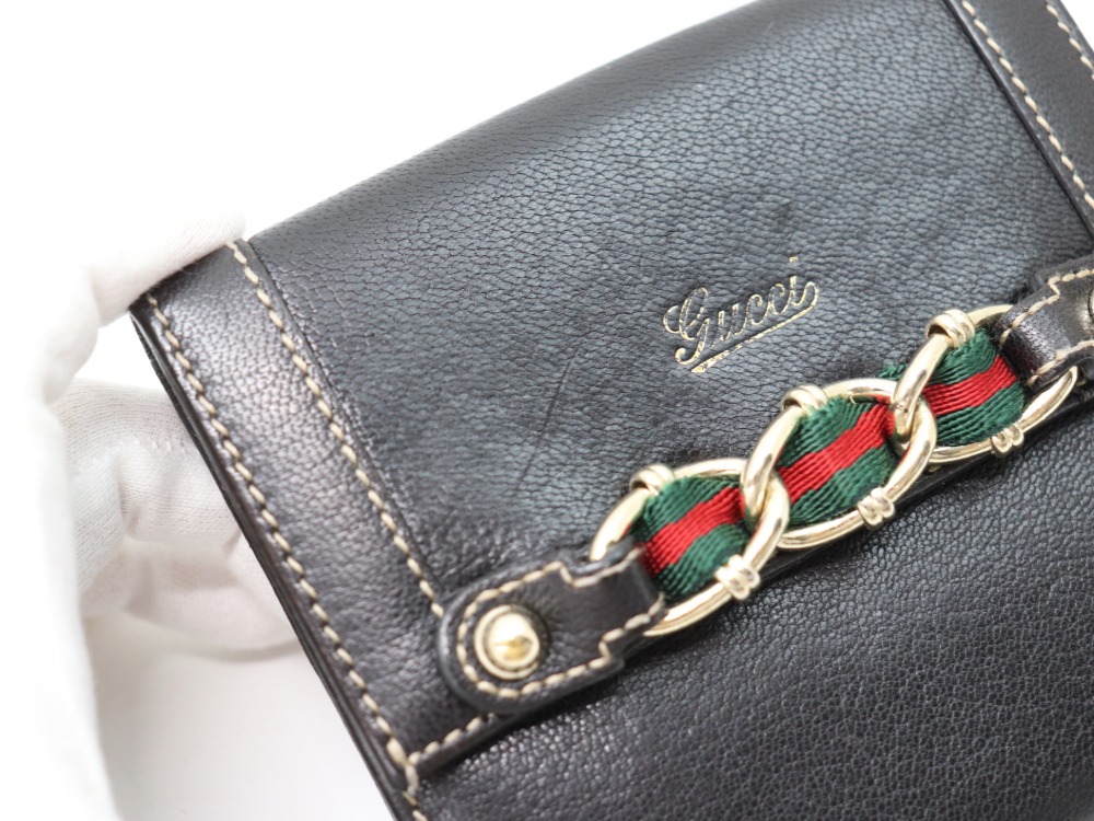 グッチシェリーラインWホック二つ折り財布傷