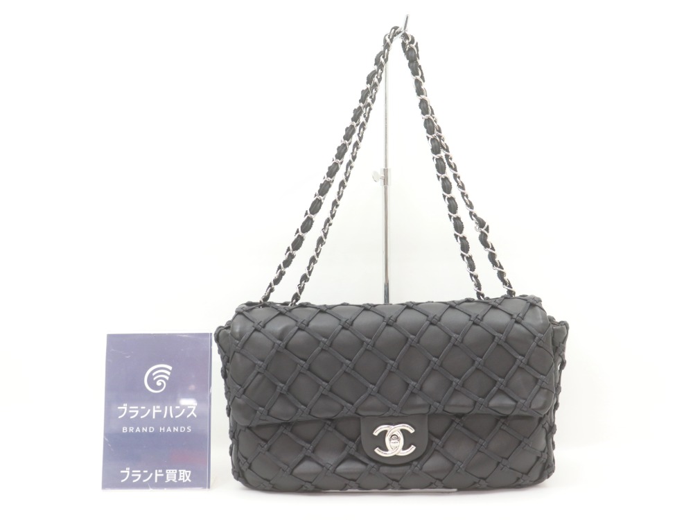 傷有シャネルの編み込みマトラッセバッグ正面
