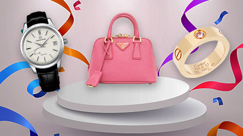 プラダのバッグとオメガの時計とカルティエのラブリング