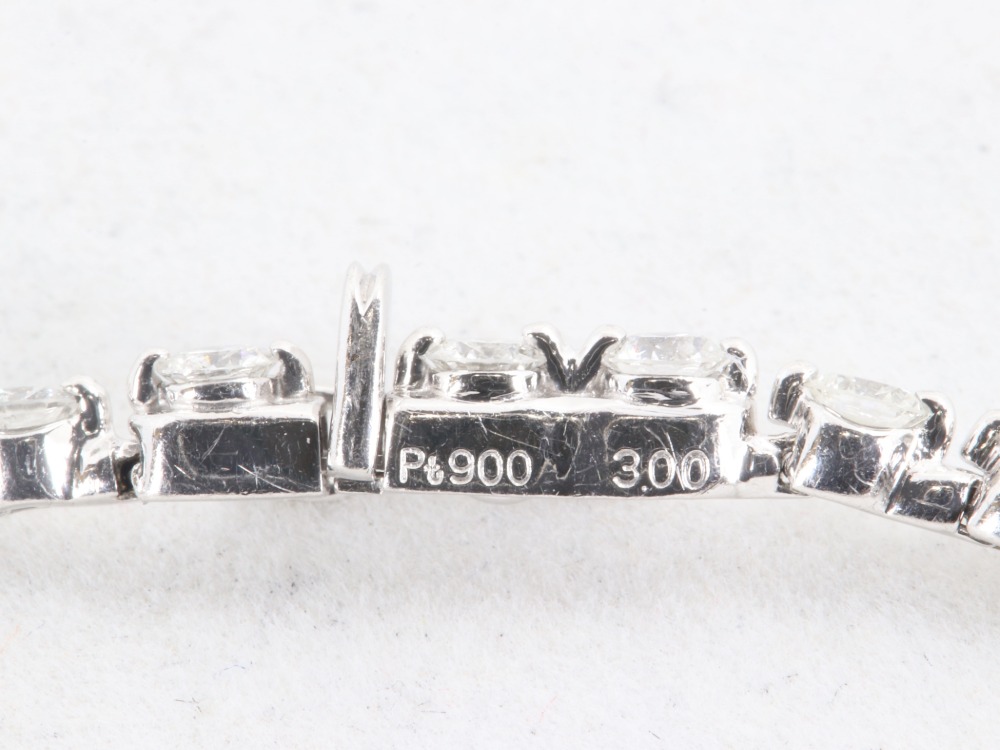 PT900テニスブレス刻印