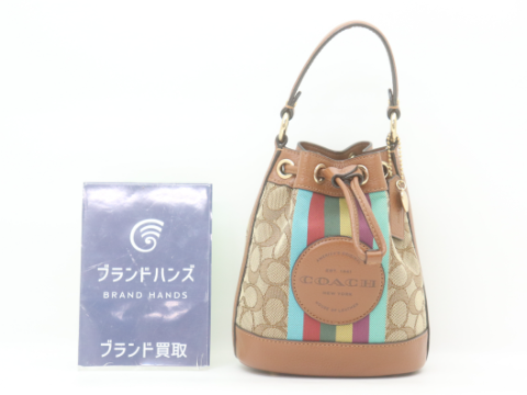 コーチ シグネチャー ミニ巾着
